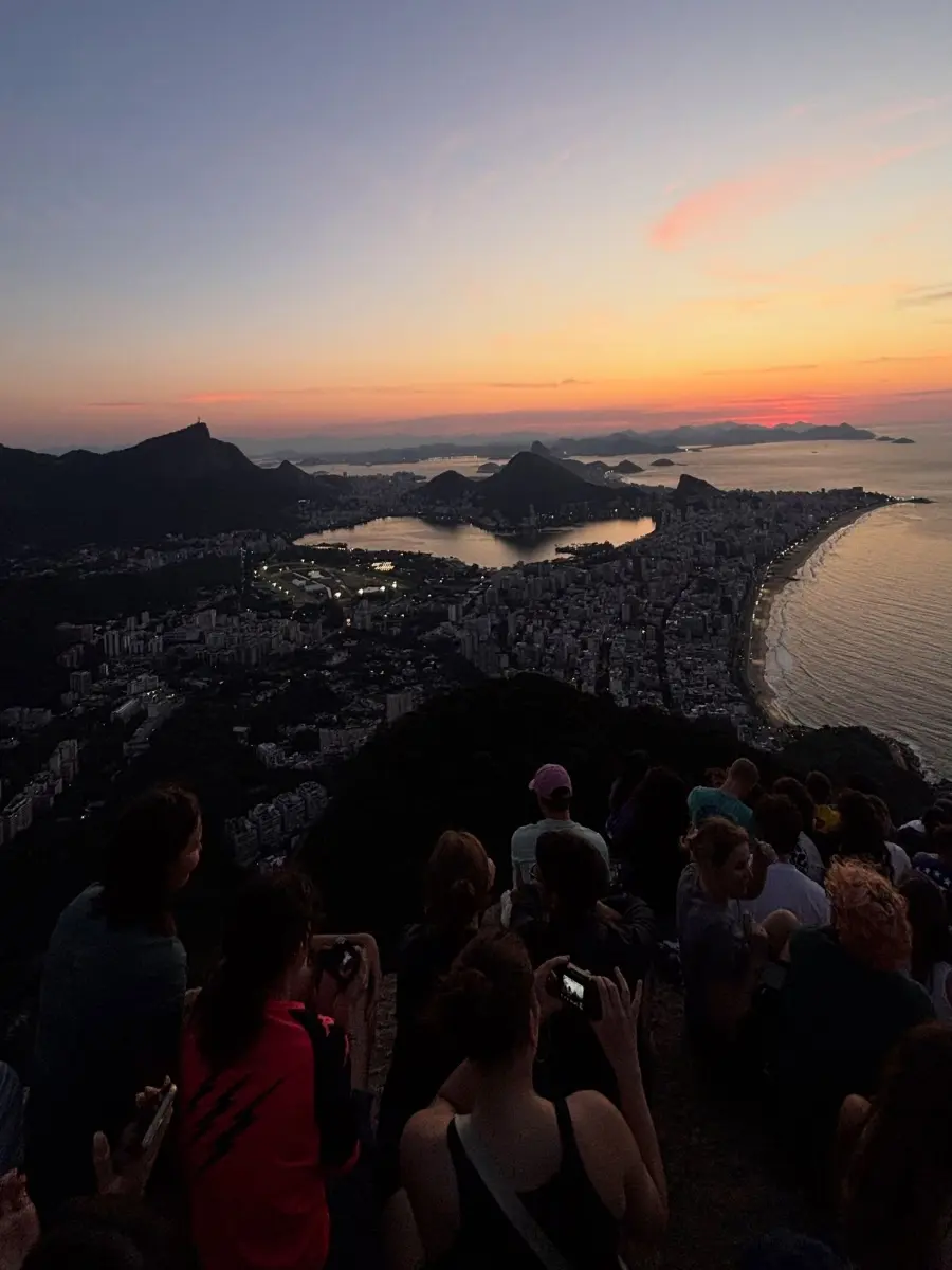A crowd waiting at the summit of Dois Irmaos for the sun to come up over Rio