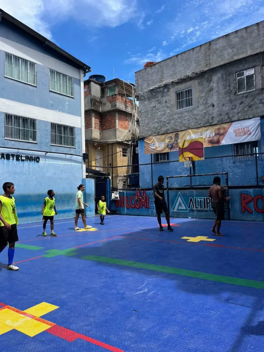 A game on Rocinha's community court on a clear day